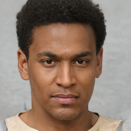 Neutral latino young-adult male with short  brown hair and brown eyes