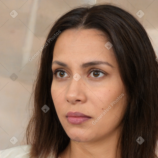 Neutral white young-adult female with long  brown hair and brown eyes