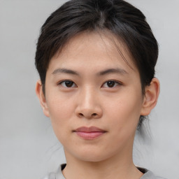 Neutral asian young-adult female with short  brown hair and brown eyes