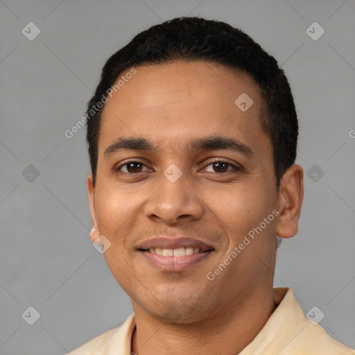 Joyful latino young-adult male with short  black hair and brown eyes