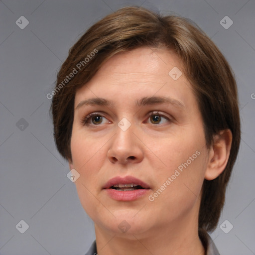 Joyful white adult female with medium  brown hair and brown eyes