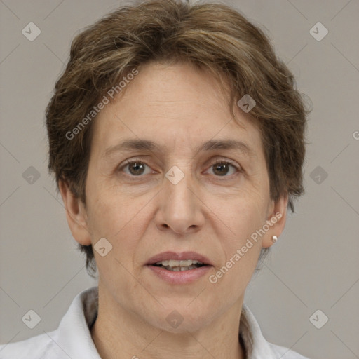 Joyful white adult female with short  brown hair and brown eyes