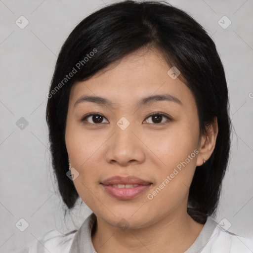 Joyful asian young-adult female with medium  black hair and brown eyes