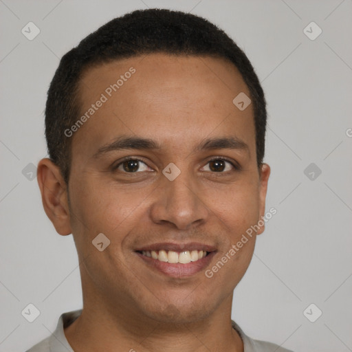 Joyful latino young-adult male with short  brown hair and brown eyes