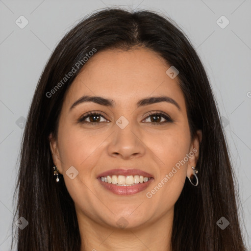 Joyful latino young-adult female with long  brown hair and brown eyes