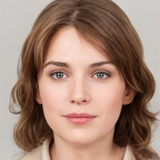 Neutral white young-adult female with medium  brown hair and grey eyes