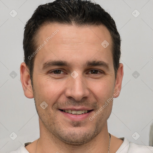 Joyful white young-adult male with short  brown hair and brown eyes