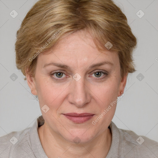 Joyful white adult female with medium  brown hair and blue eyes