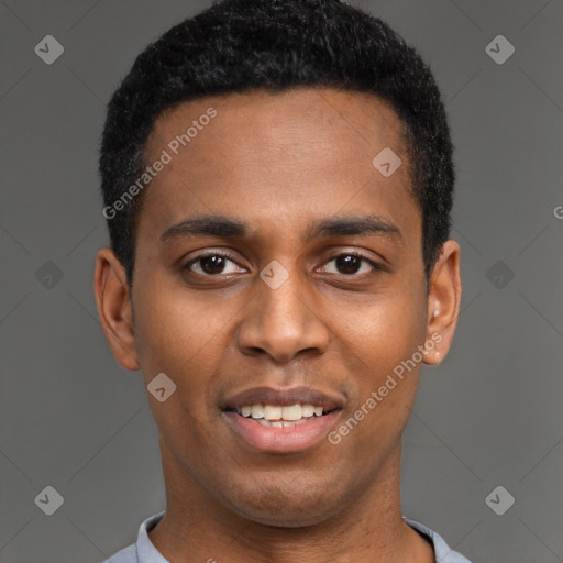 Joyful black young-adult male with short  brown hair and brown eyes