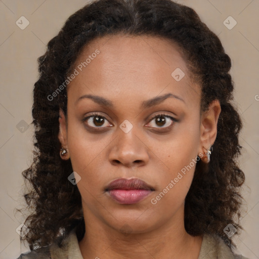 Neutral black young-adult female with medium  brown hair and brown eyes