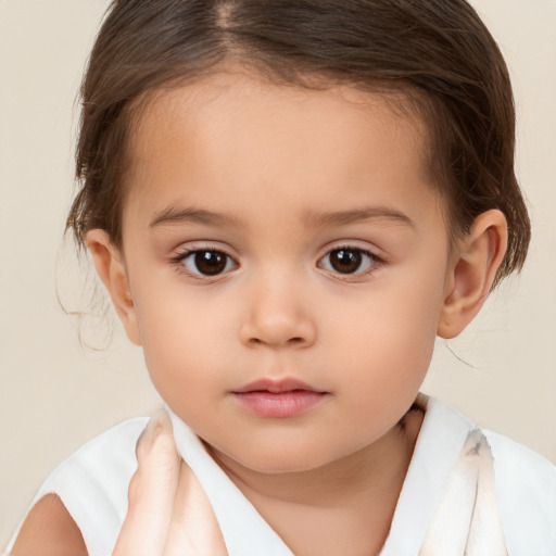 Neutral white child female with short  brown hair and brown eyes