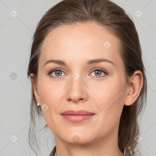 Joyful white young-adult female with medium  brown hair and grey eyes