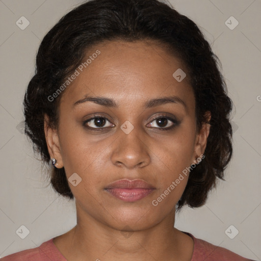 Joyful black young-adult female with medium  brown hair and brown eyes