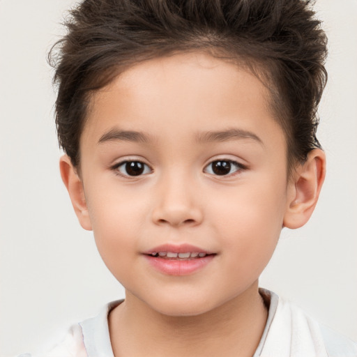 Joyful white child female with short  brown hair and brown eyes