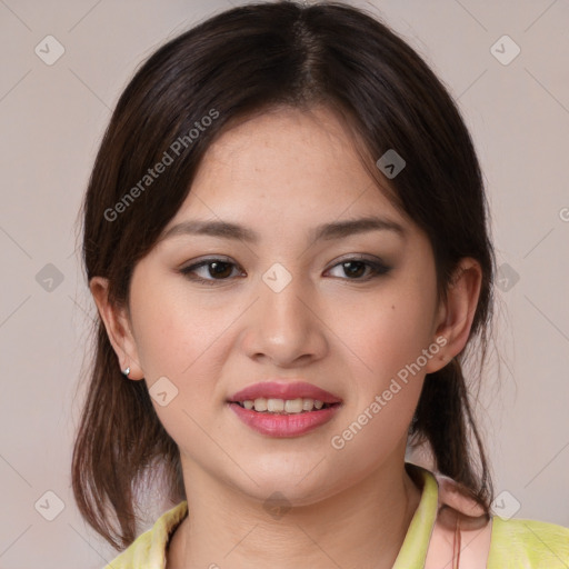 Joyful white young-adult female with medium  brown hair and brown eyes