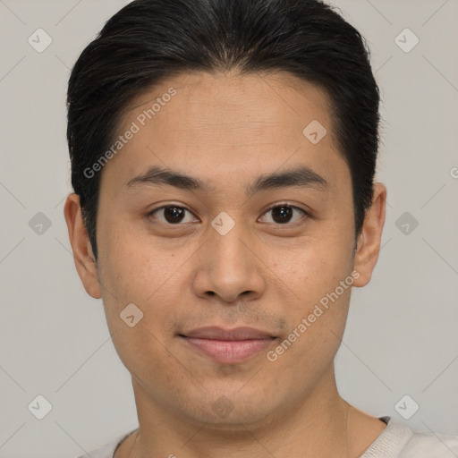 Joyful asian young-adult male with short  brown hair and brown eyes