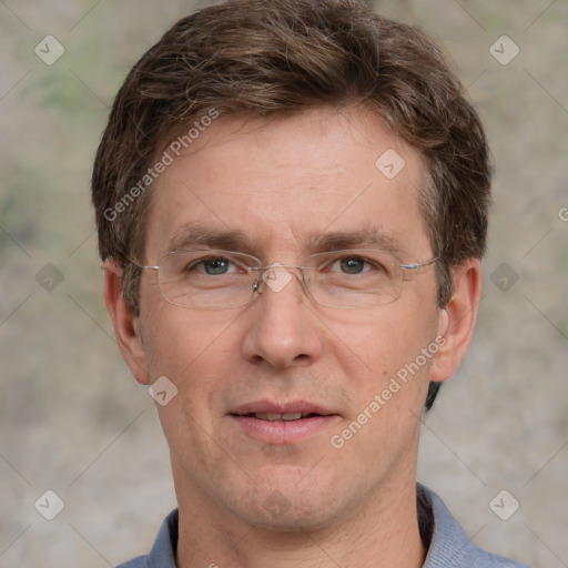 Joyful white adult male with short  brown hair and grey eyes