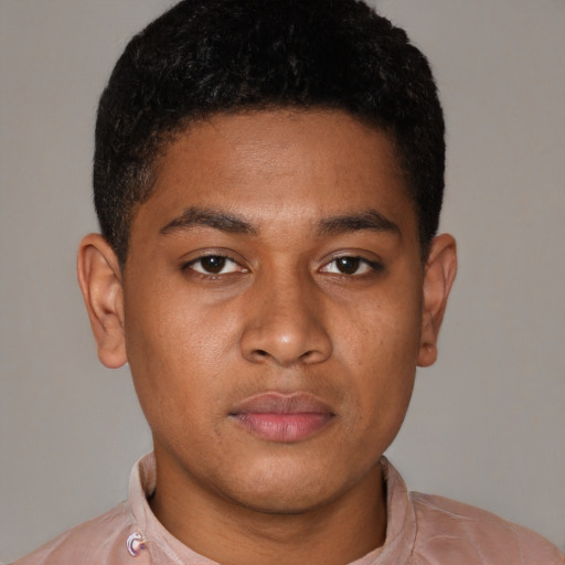Neutral latino young-adult male with short  brown hair and brown eyes