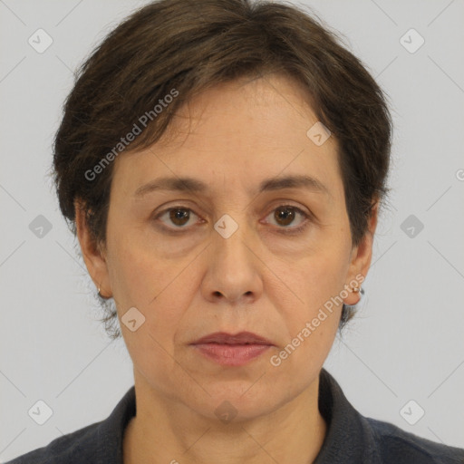 Joyful white adult female with short  brown hair and brown eyes