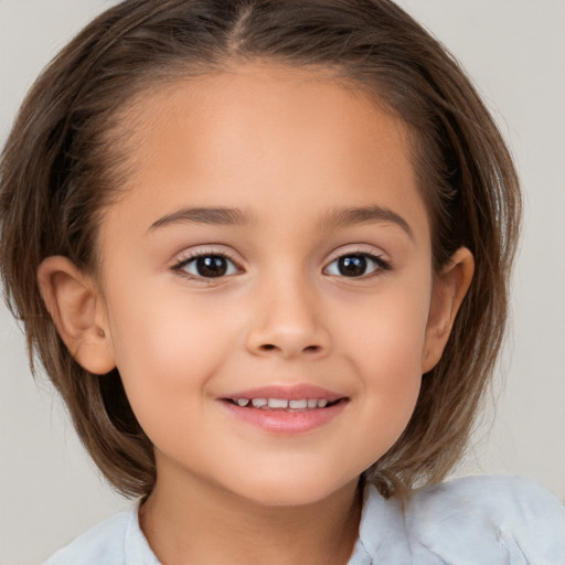 Joyful white child female with medium  brown hair and brown eyes