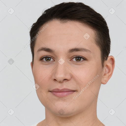 Joyful white young-adult female with short  brown hair and brown eyes