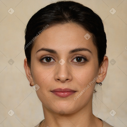 Joyful white young-adult female with long  brown hair and brown eyes