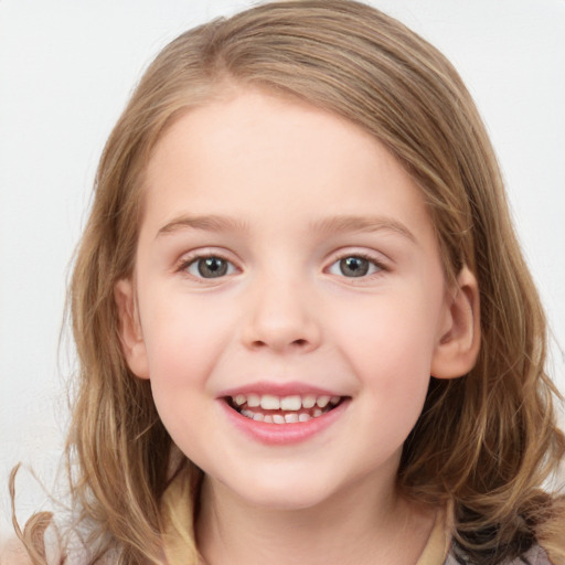 Joyful white child female with medium  brown hair and blue eyes