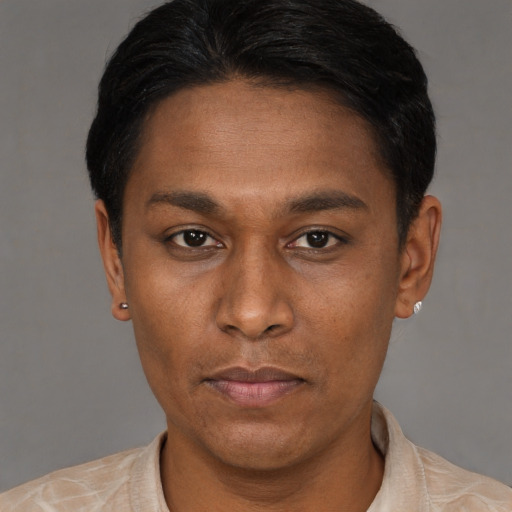 Neutral latino adult male with short  brown hair and brown eyes