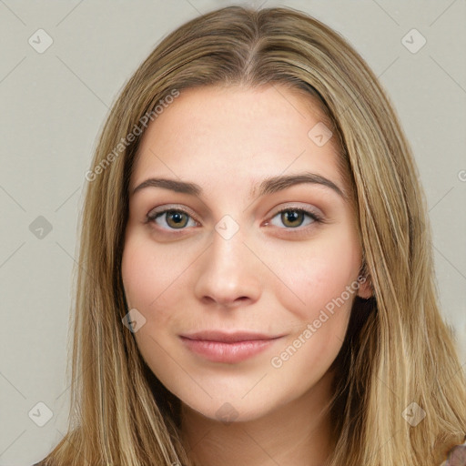 Joyful white young-adult female with long  brown hair and green eyes