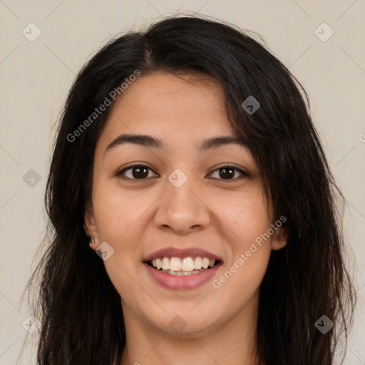 Joyful latino young-adult female with long  brown hair and brown eyes