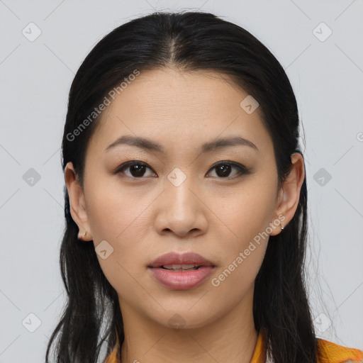 Joyful asian young-adult female with long  brown hair and brown eyes