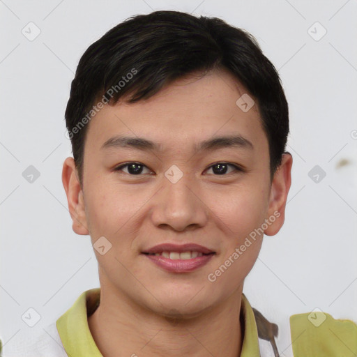 Joyful asian young-adult male with short  brown hair and brown eyes