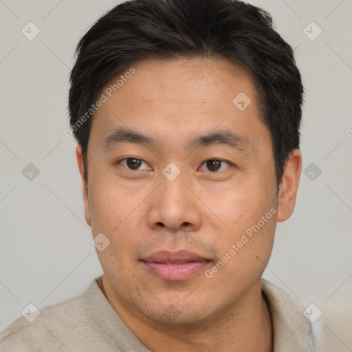 Neutral asian young-adult male with short  brown hair and brown eyes