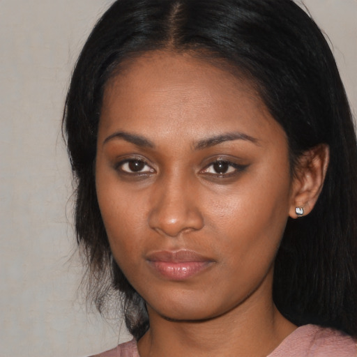 Neutral asian young-adult female with medium  brown hair and brown eyes