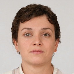 Neutral white young-adult female with short  brown hair and brown eyes