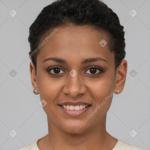 Joyful black young-adult female with short  brown hair and brown eyes