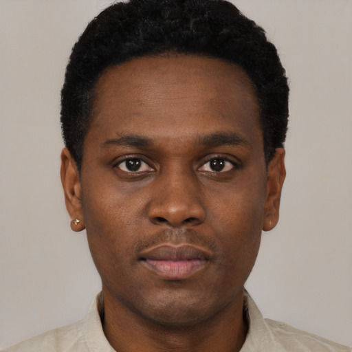 Neutral black young-adult male with short  black hair and brown eyes