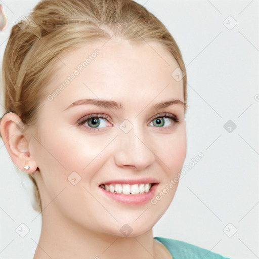 Joyful white young-adult female with medium  brown hair and blue eyes