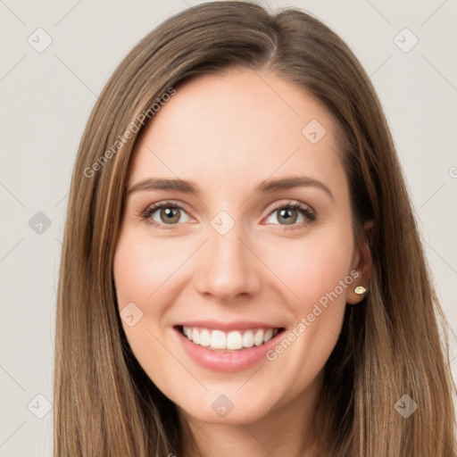 Joyful white young-adult female with long  brown hair and green eyes