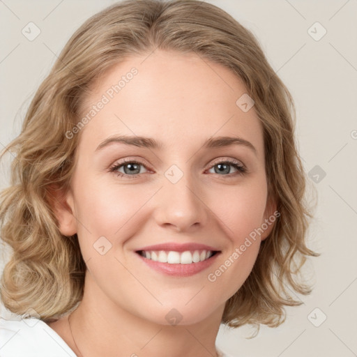 Joyful white young-adult female with medium  brown hair and blue eyes