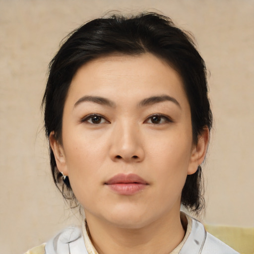 Neutral asian young-adult female with medium  black hair and brown eyes