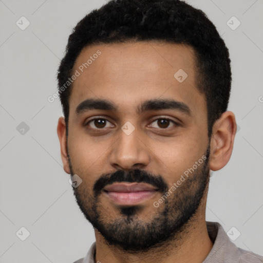 Neutral black young-adult male with short  black hair and brown eyes