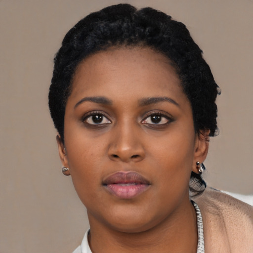 Neutral black young-adult female with short  black hair and brown eyes