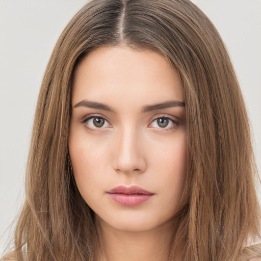 Neutral white young-adult female with long  brown hair and brown eyes