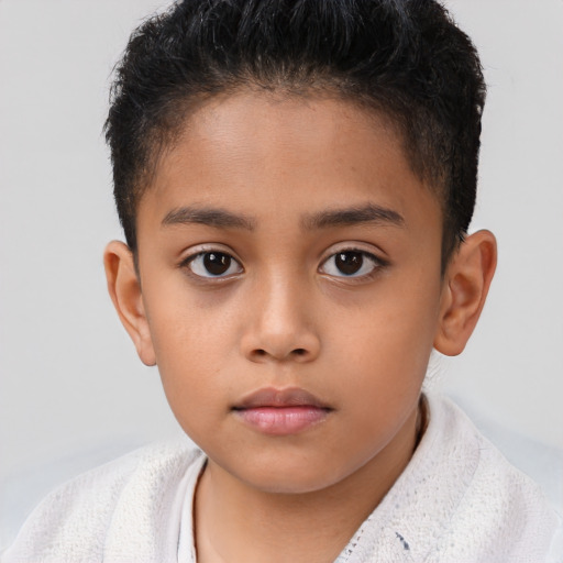 Neutral latino child male with short  brown hair and brown eyes