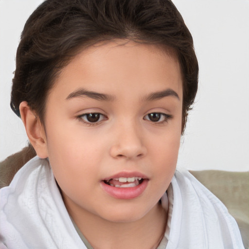 Joyful white child female with short  brown hair and brown eyes