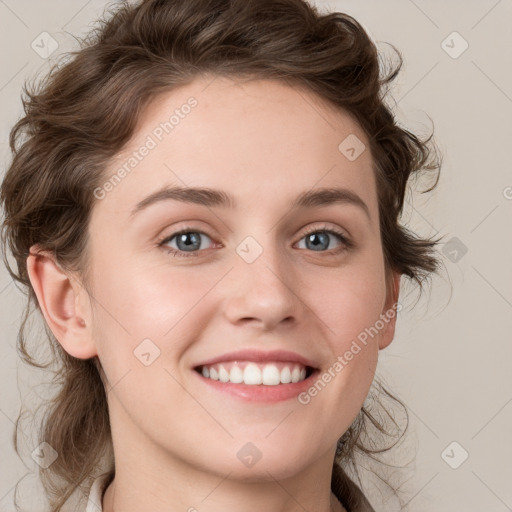 Joyful white young-adult female with medium  brown hair and blue eyes