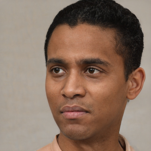 Neutral black young-adult male with short  black hair and brown eyes