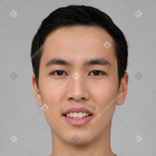 Joyful asian young-adult male with short  black hair and brown eyes