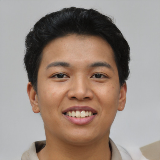 Joyful asian young-adult female with short  brown hair and brown eyes